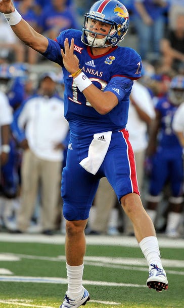 Jayhawks' QB duel produces dual QBs in season-opening win